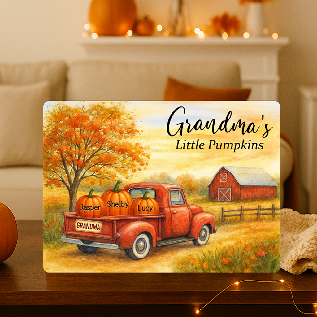 Personalized Pumpkin Grandma Sign on wooden table.